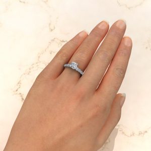 Graduated Shared Prong Cushion Cut Moissanite Engagement Ring