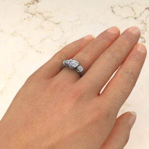 Three Half Bezel Round Cut Moissanite Engagement Ring