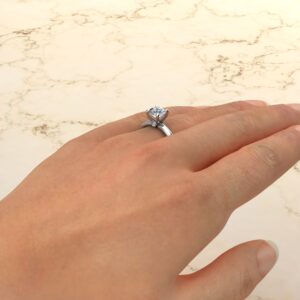 Peekaboo Solitaire Round Cut Moissanite Engagement Ring