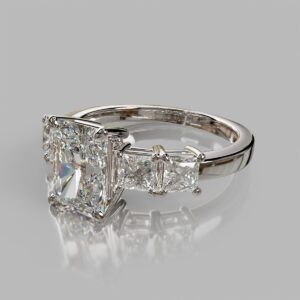 radiant-cut-diamond-three-stone-ring-white-gold-side-view-512.jpg